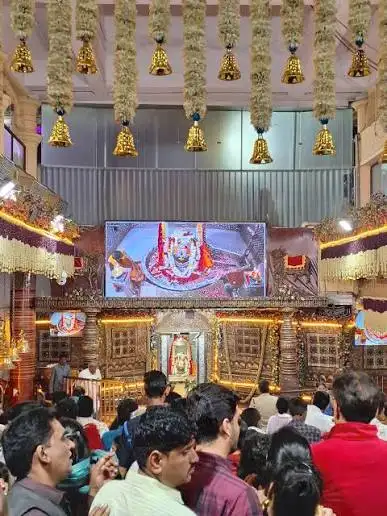 Devotees waiting inside the Mahakaleshwar Jyotirlinga darshan area in Ujjain