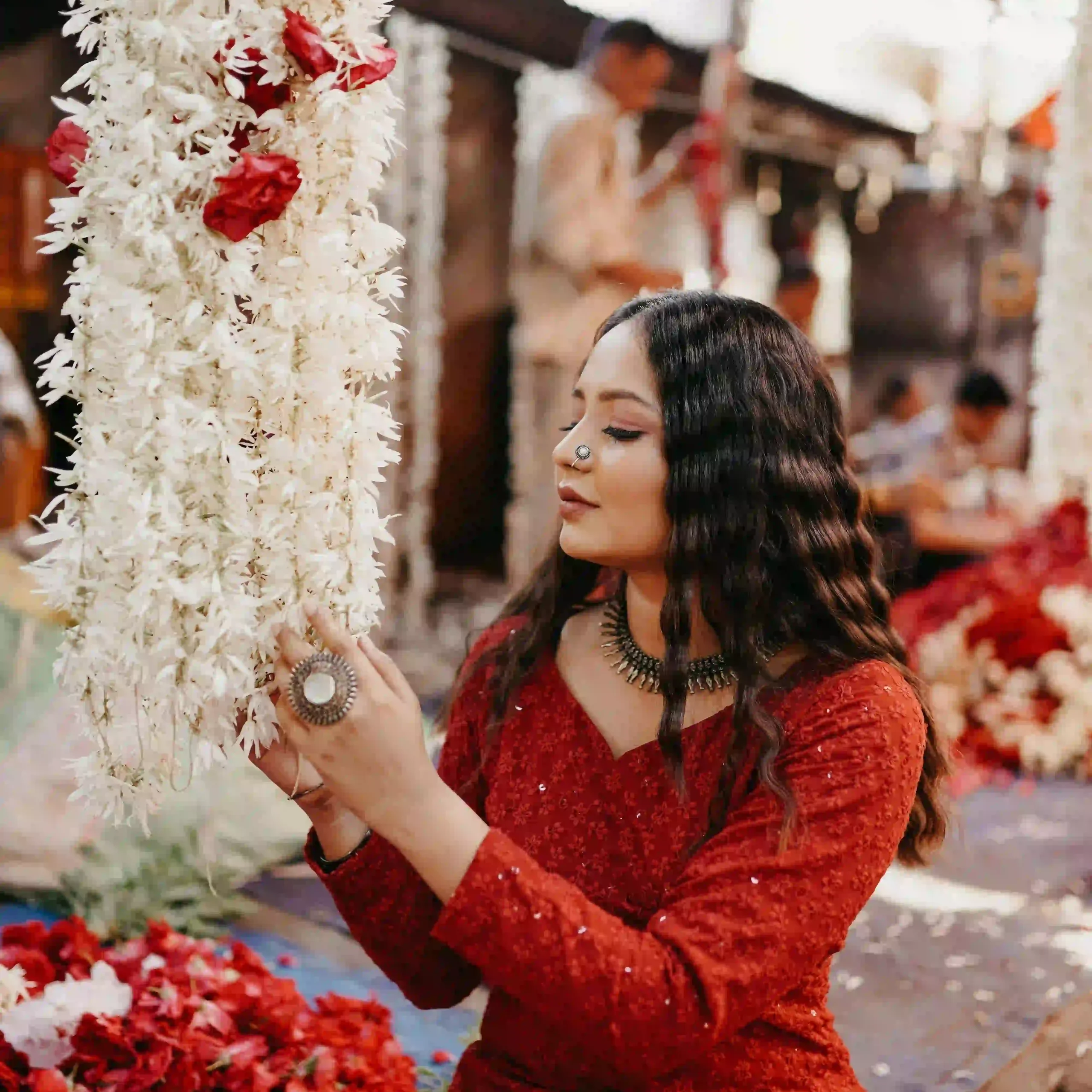 Indian woman choosing flowers during a meaningful Ujjain temple journey for marriage clarity