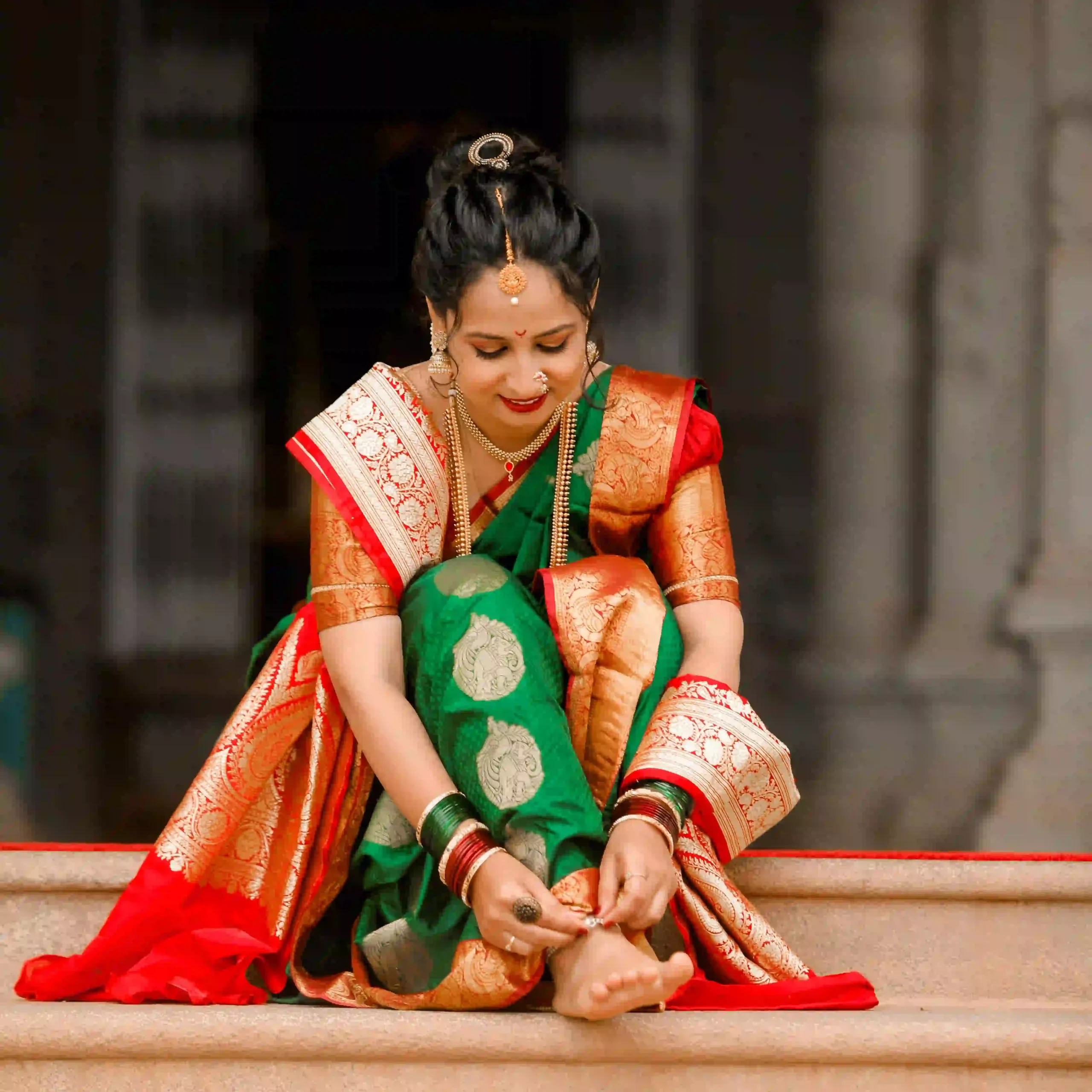 Indian woman in traditional attire during a meaningful temple journey in Ujjain