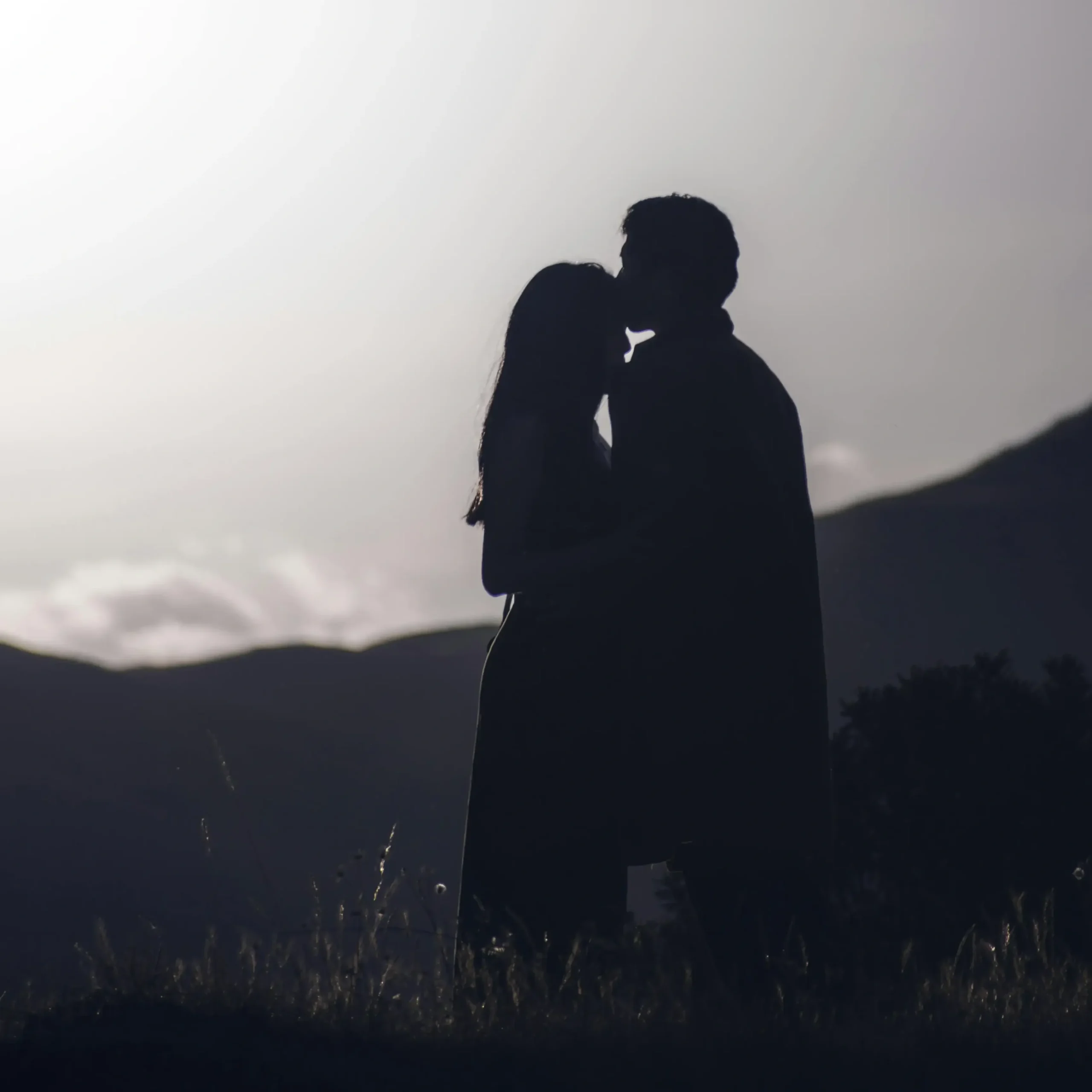Couple sharing a quiet moment together during a mountain getaway