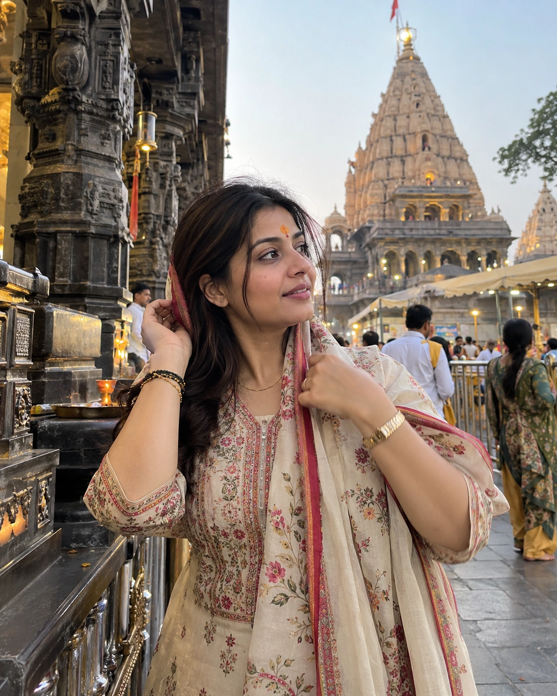 Indian woman preparing quietly for temple darshan during a solo Ujjain Mahakal trip